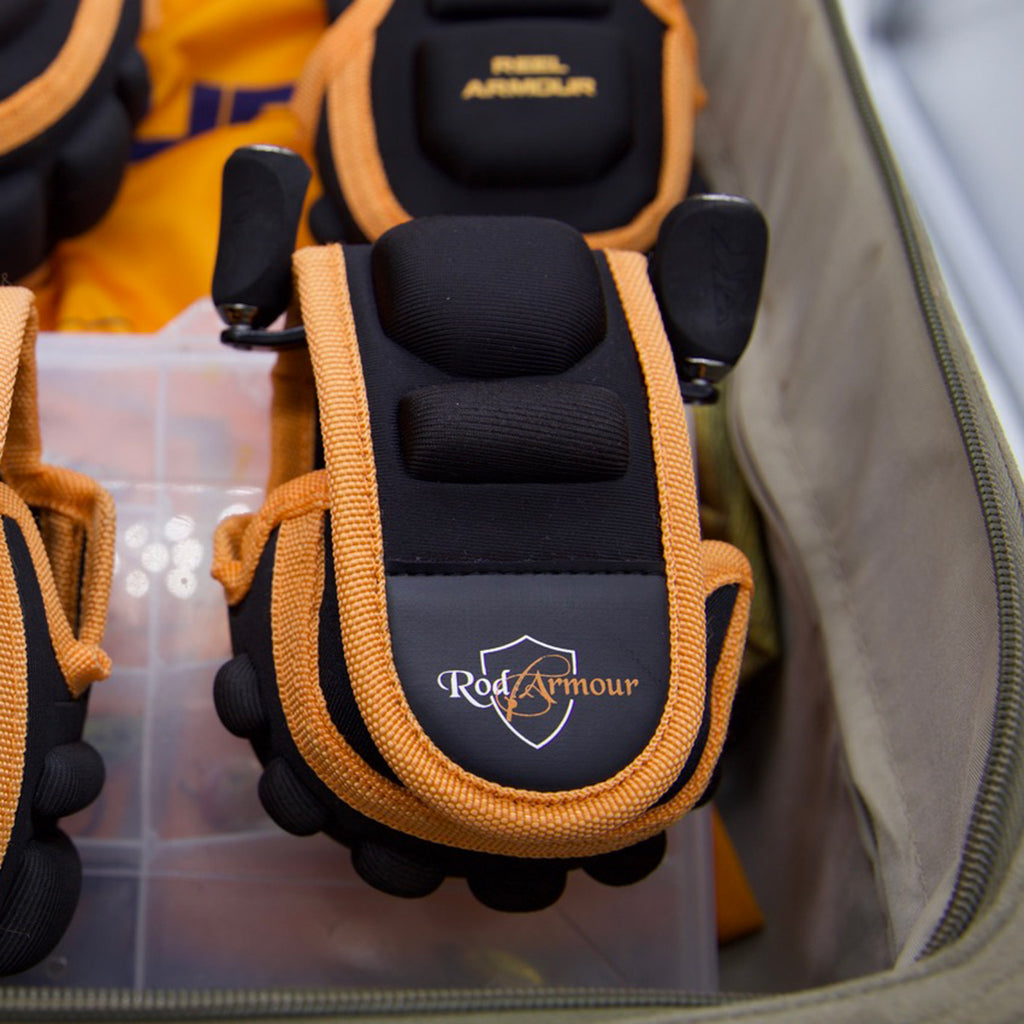 Black and orange baitcaster fishing reel protector case