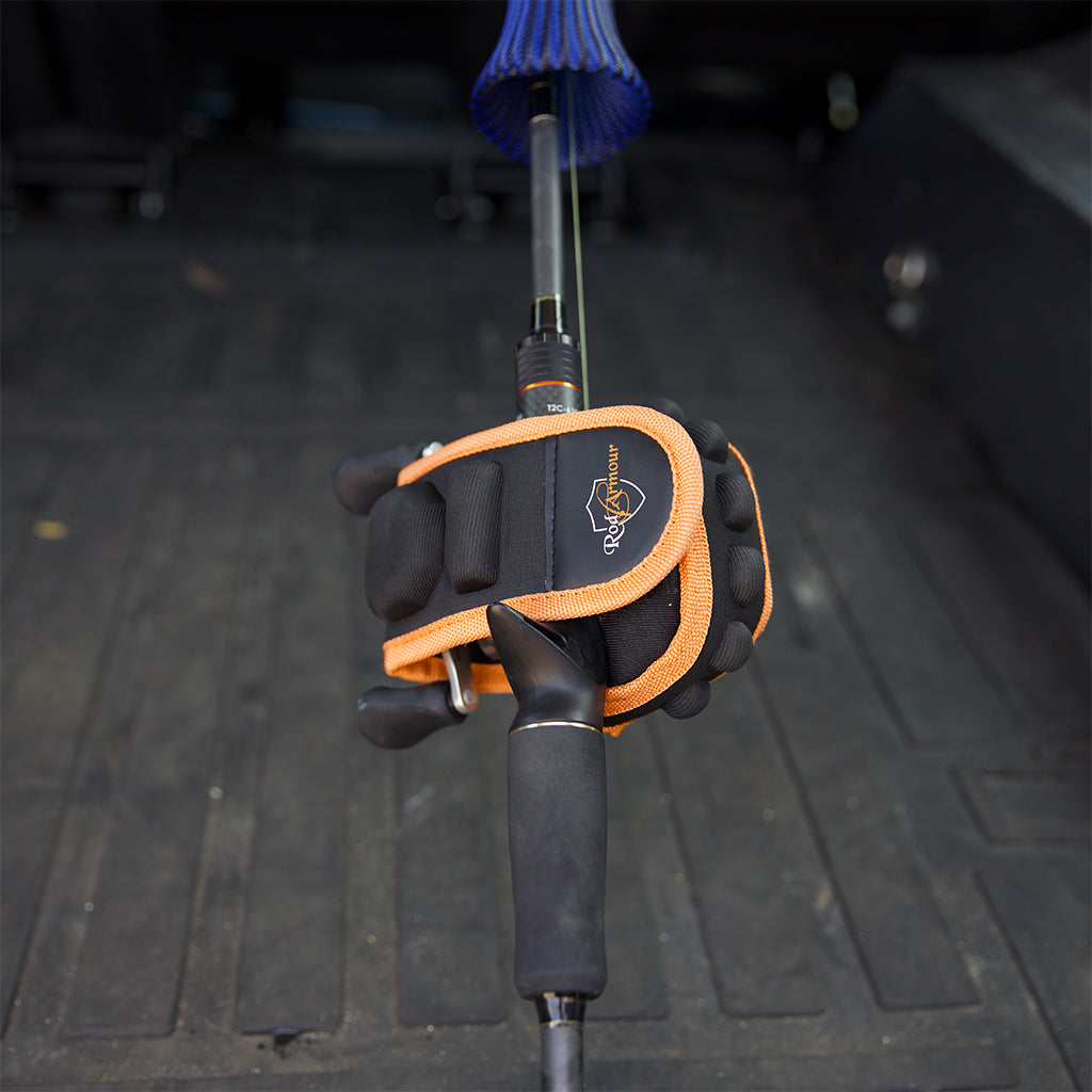 Black and orange baitcaster fishing reel protective cover