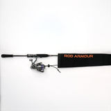 Spinning rod and reel partially inserted into Rod Armour Pro sleeve, flat-lay