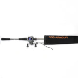 Baitcast combo partially inserted into Rod Armour Pro sleeve, top-down flat-lay