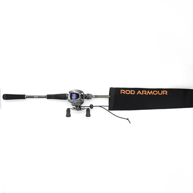 Baitcast combo partially inserted into Rod Armour Pro sleeve, top-down flat-lay
