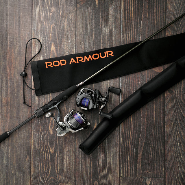 Spinning combo and Rod Armour Pro sleeve laid on dark timber decking