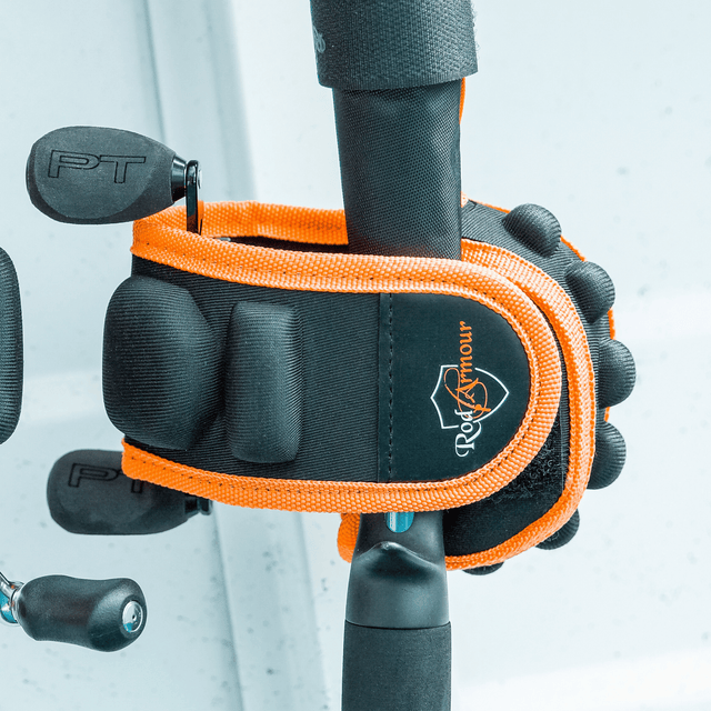 Baitcast Reel Cover wrapped around a low-profile baitcaster with PT brake caps visible