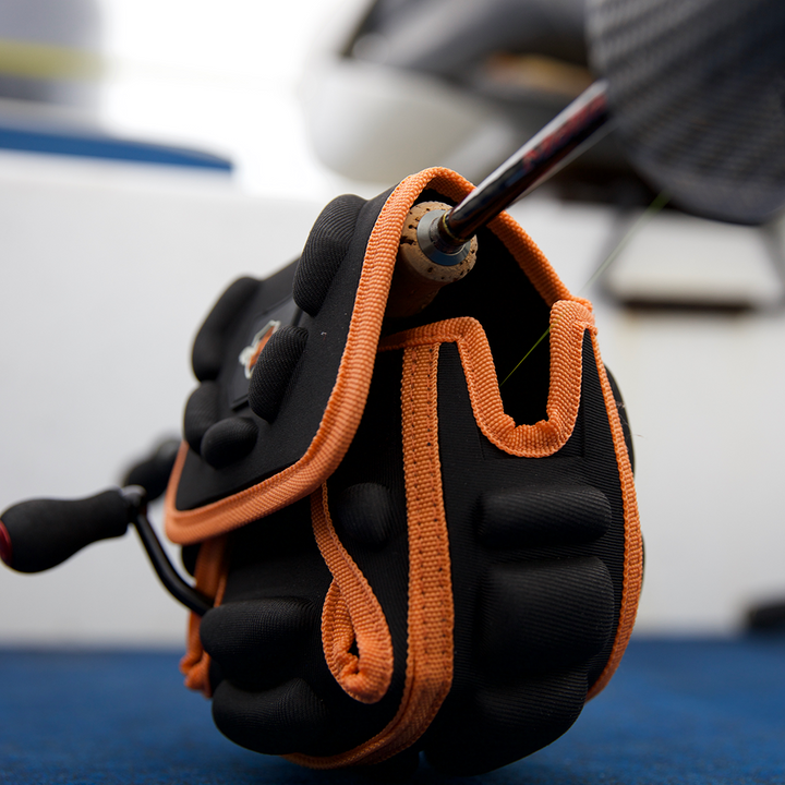 Black and orange spinning reel protective case 
