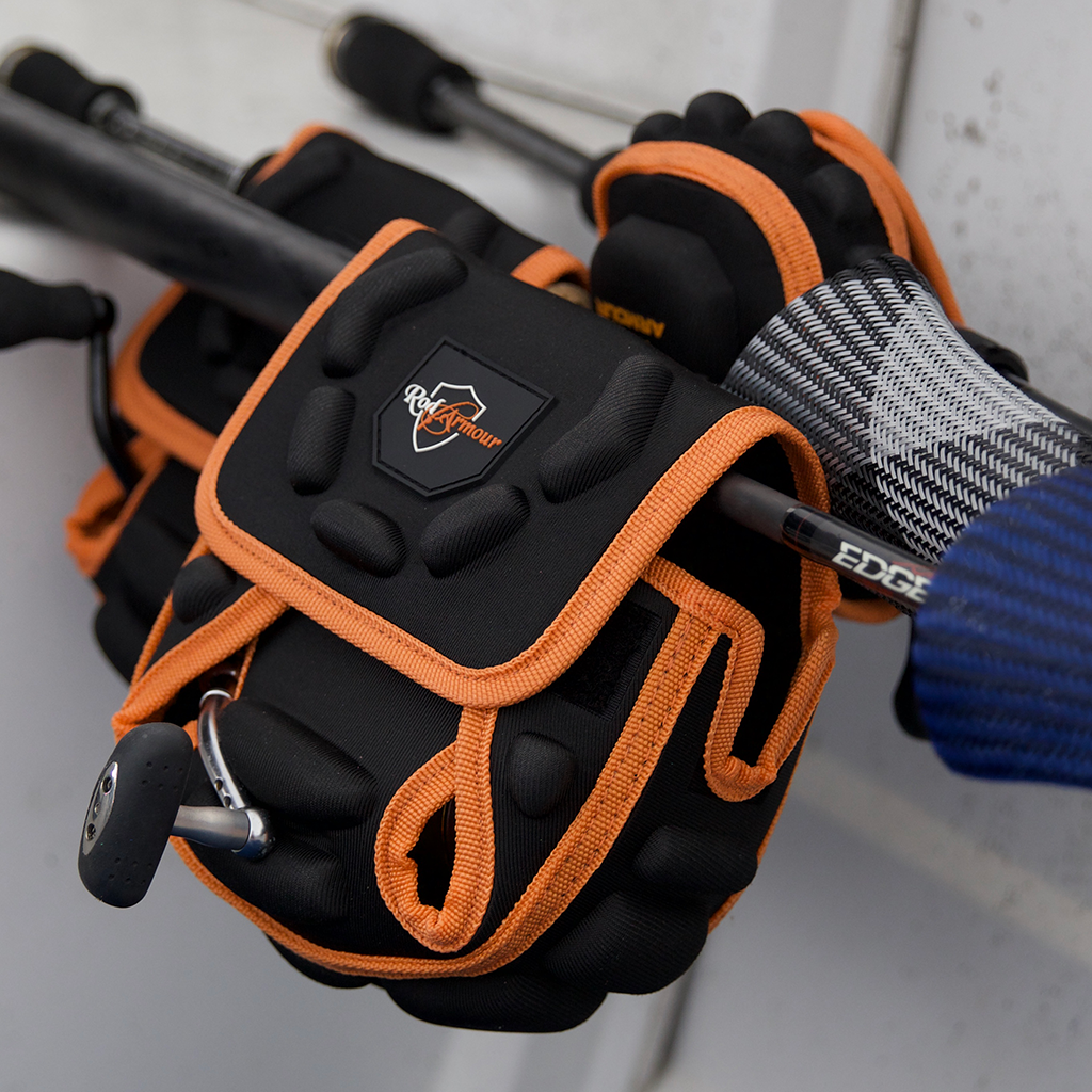 Black and orange spinning reel protective cover