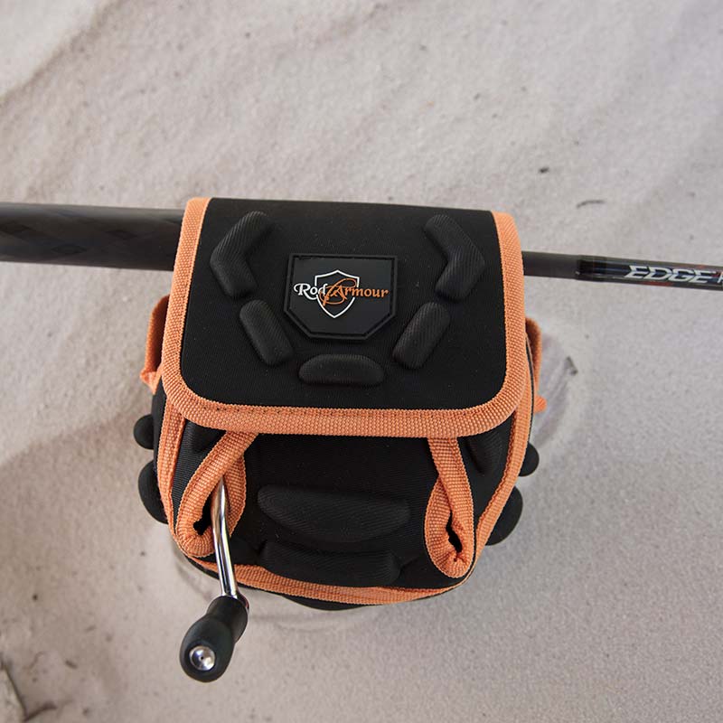 Black and orange spinning reel protective case 