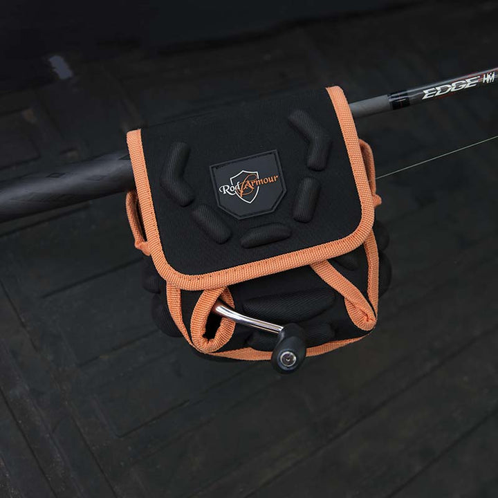 Black and orange spinning reel protective cover